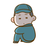 【生活・人】作業服を着た工場で働く人(作業員) 体育座りで落ち込んでいる様子のフリーイラスト